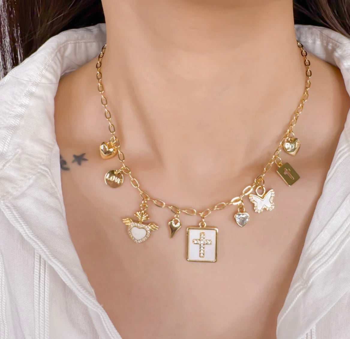 AN106 18 k gold charm necklace