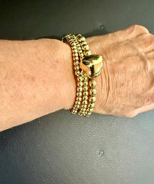 Three-Strand Heart Charm Bracelet – La Tour Salon of Paris